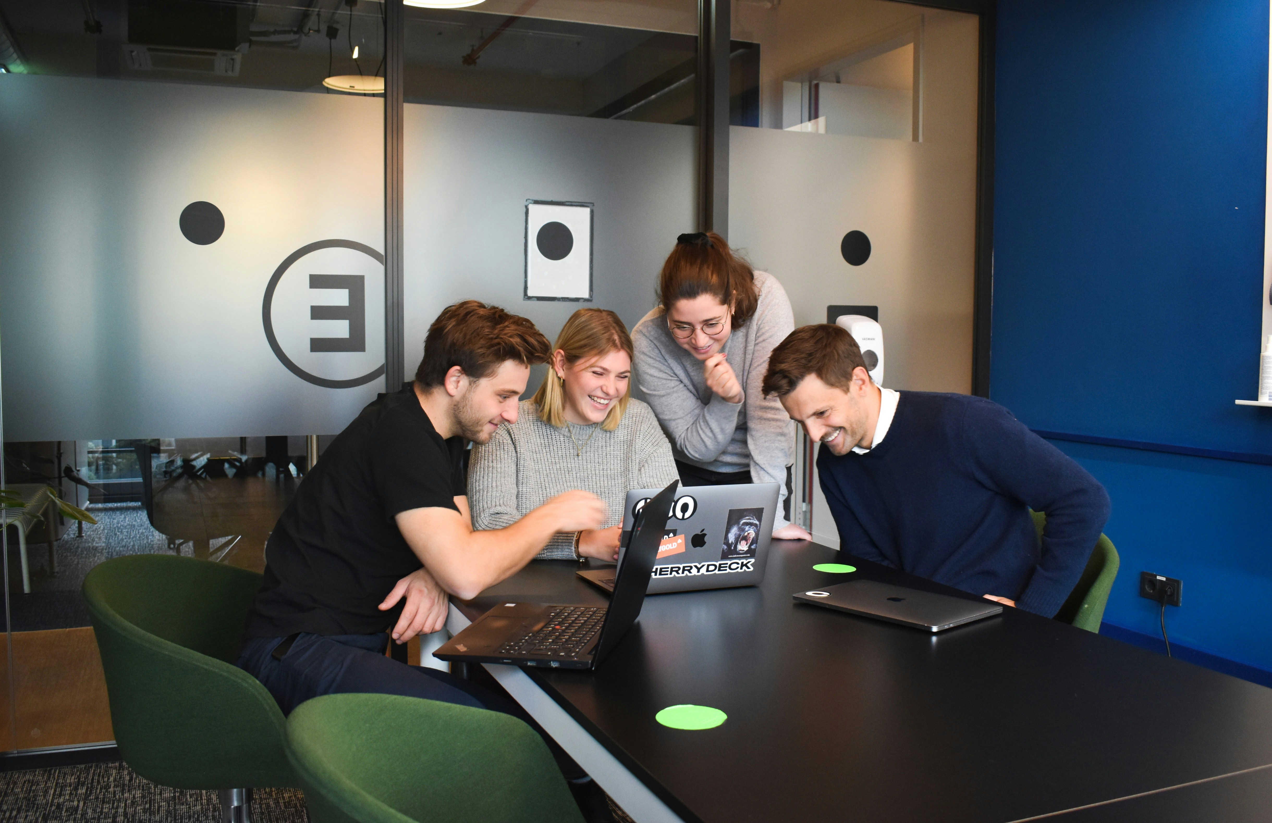 A team looking at research results
