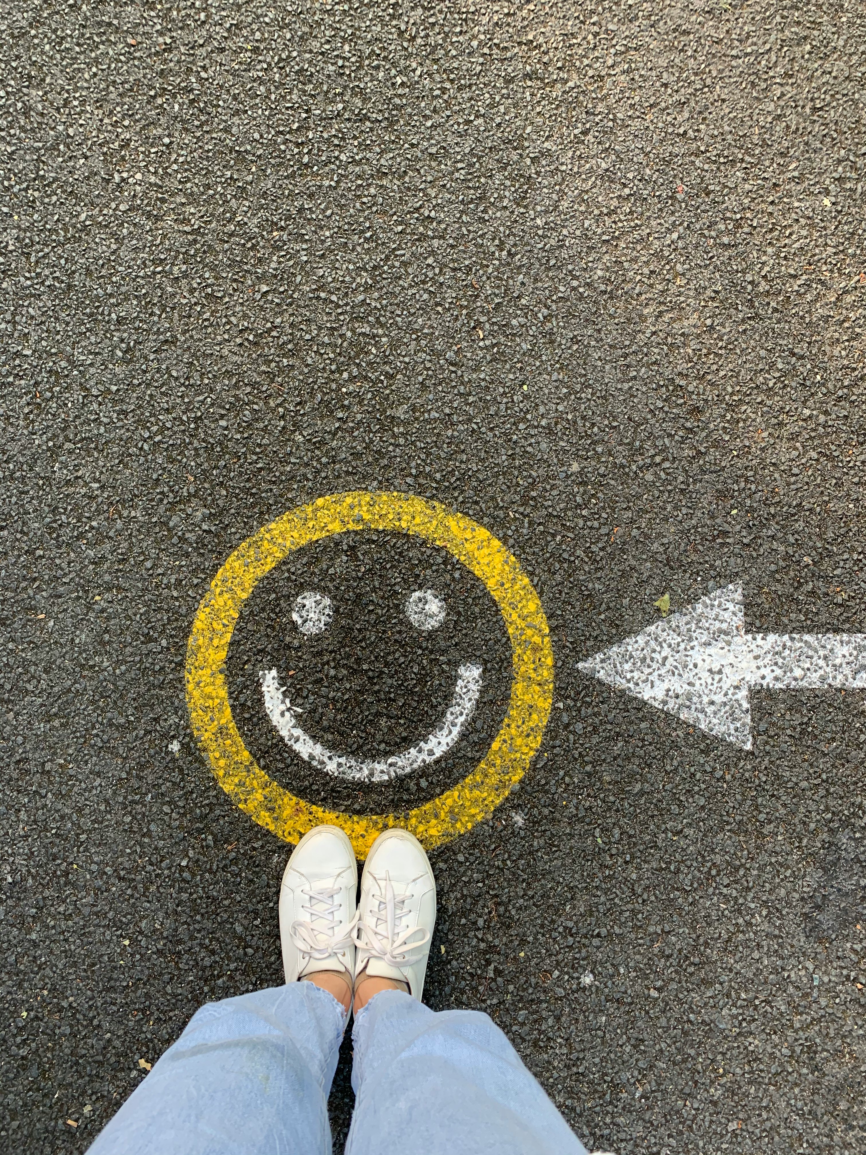 A smiley drawn on the pavement